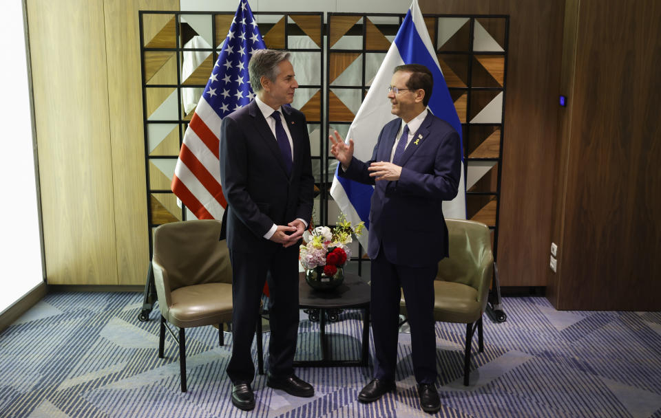 U.S. Secretary of State Antony Blinken, left, meets with Israeli President Isaac Herzog in Tel Aviv, Israel Wednesday, May 1, 2024. (Evelyn Hockstein/Pool Photo via AP)