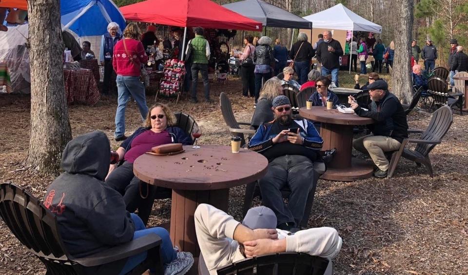 People relax, sip, shop and mingle at Spring Run Vineyards in Chesterfield in December 2021.