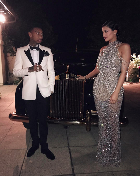 Tyga and Kylie Jenner pose for Kris Jenner’s 60th birthday party