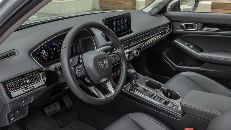 A photo of the interior of a Civic sedan. 