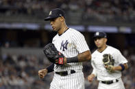 New York Yankees left fielder Aaron Hicks runs back to the dugout during the fourth inning of the team's baseball game against the Tampa Bay Rays on Friday, Sept. 9, 2022, in New York. (AP Photo/Adam Hunger)