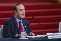 Guatemalan President Alejandro Giammattei speaks during a press conference at the National Palace in Guatemala City, Tuesday, July 27, 2021. The U.S. government has suspended cooperation with Guatemala's Attorney General's Office in response to the firing of its top anti-corruption prosecutor Juan Francisco Sandoval according to U.S. State Department. (AP Photo/Oliver de Ros)