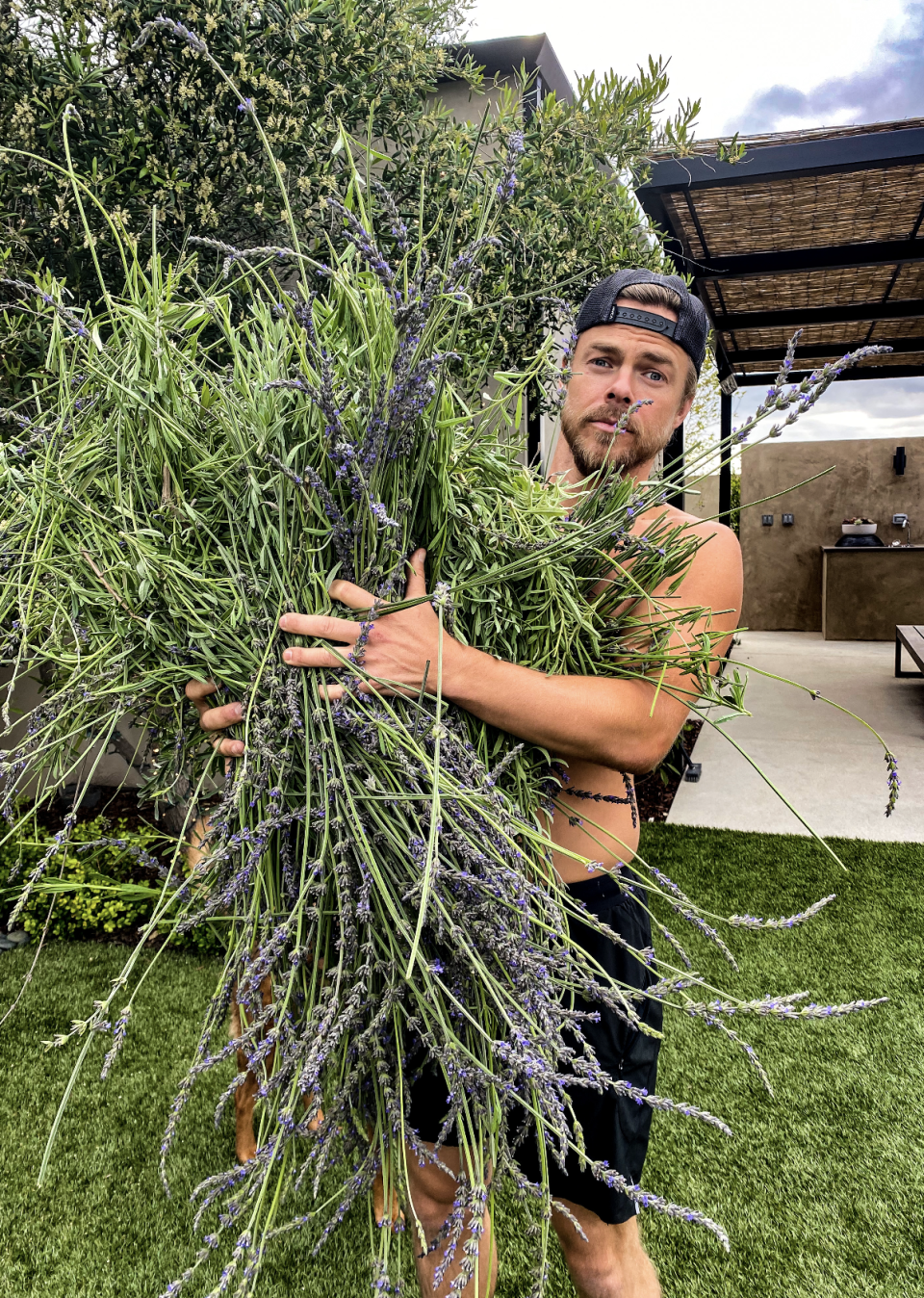 Quarantine has given rise to a new hobby for Derek Hough: gardening.  "It's this nice ritual in the morning," he says. There are even plans for a bigger garden in the yard.