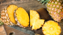<p> Want to jazz up your fruit bowl? Try pineapple - which is 86 per cent water. The hydrating tropical fruit also contains the anti-inflammatory enzyme bromelain, which <a href="https://www.ncbi.nlm.nih.gov/pmc/articles/PMC538506/" rel="nofollow noopener" target="_blank" data-ylk="slk:research;elm:context_link;itc:0;sec:content-canvas" class="link ">research</a> has shown may help in the treatment of osteoporosis, of which post-menopausal women are at a much higher risk. </p>