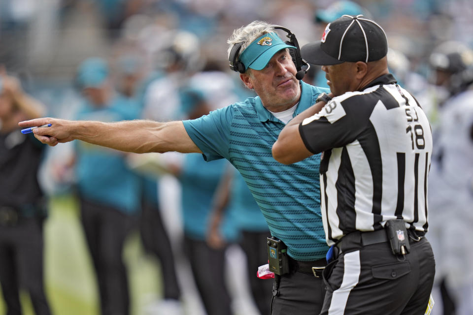 Jacksonville Jaguars head coach Doug Pederson questions side judge Clay Reynard (18) during the second half of an NFL football game against the Cleveland Browns Sunday, Sept. 15, 2024, in Jacksonville, Fla. (AP Photo/John Raoux)