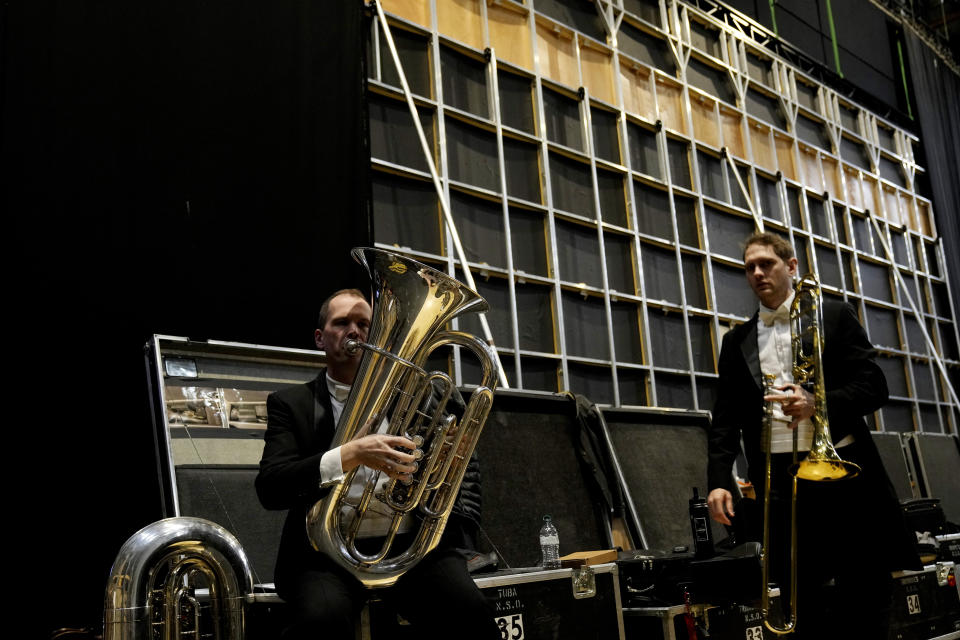 Musicians of the National Symphony Orchestra (NSO) wait at the backstage prior to the start of the concert at Milan's La Scala theatre, Italy, Monday, Feb. 26, 2024. (AP Photo/Antonio Calanni)