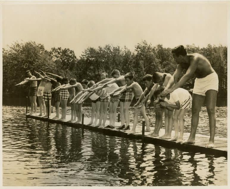 Boys at a swimming lesson at a country camp, circa 1950, from the National Jewish Welfare Board Records.