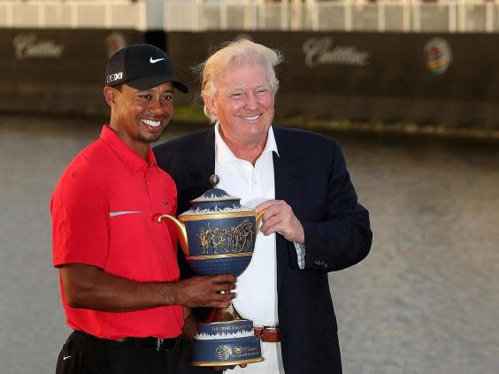 Tiger Woods with Donald Trump in 2013 after the Cadillac Championship (Getty Images)