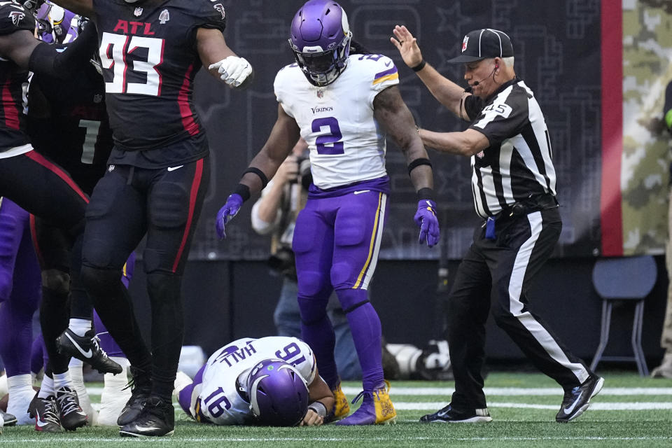 Minnesota Vikings quarterback Jaren Hall (16) lies on the field injured after being tackled short of the goal line during the first half of an NFL football game against the Atlanta Falcons, Sunday, Nov. 5, 2023, in Atlanta. (AP Photo/John Bazemore)