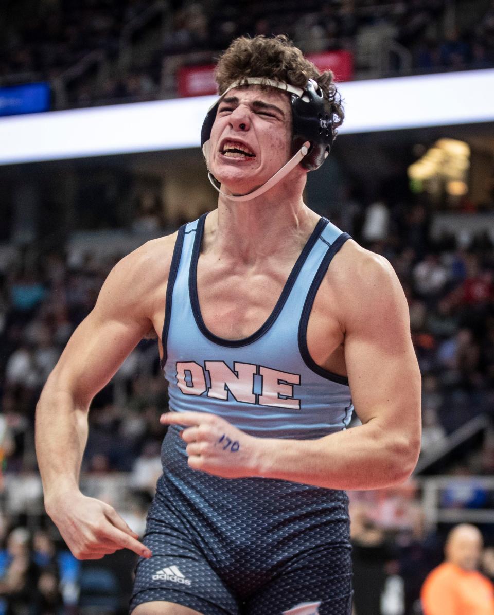 Leo Venables of Carmel celebrates after defeating Gage Laplante of St. Francis in a 170-pound semifinal match during the NYSPHSAA Wrestling Championships at the MVP Arena in Albany Feb. 24, 2024.