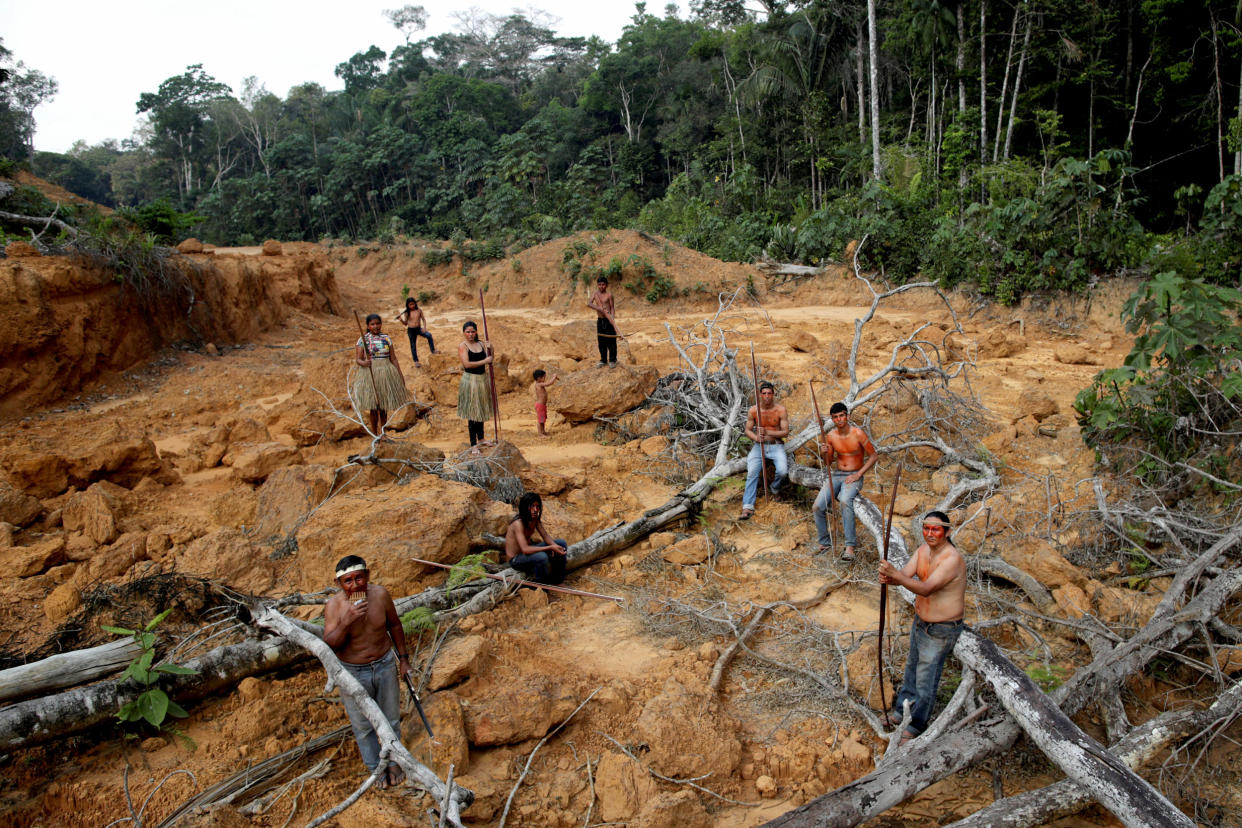 Image: Indigenous members of the Mura tribe in a deforested area on unmarked indigenous lands inside the Amazon rainforest on Aug. 20, 2019. (Ueslei Marcelino / Reuters file)
