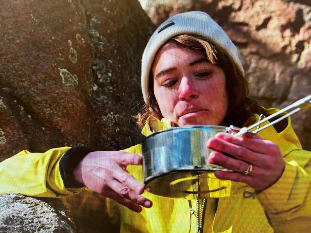 Bone broth, sure, but rotting elk bone marrow broth? Tatiana Maslany drinks the brew. (National Geographic)