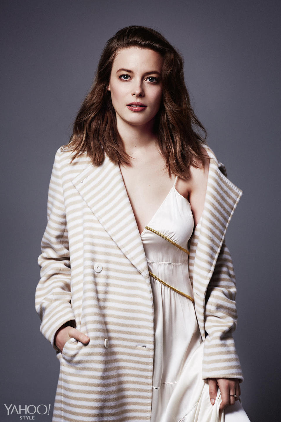 Gillian Jacobs wears a striped Max Mara cashmere coat.