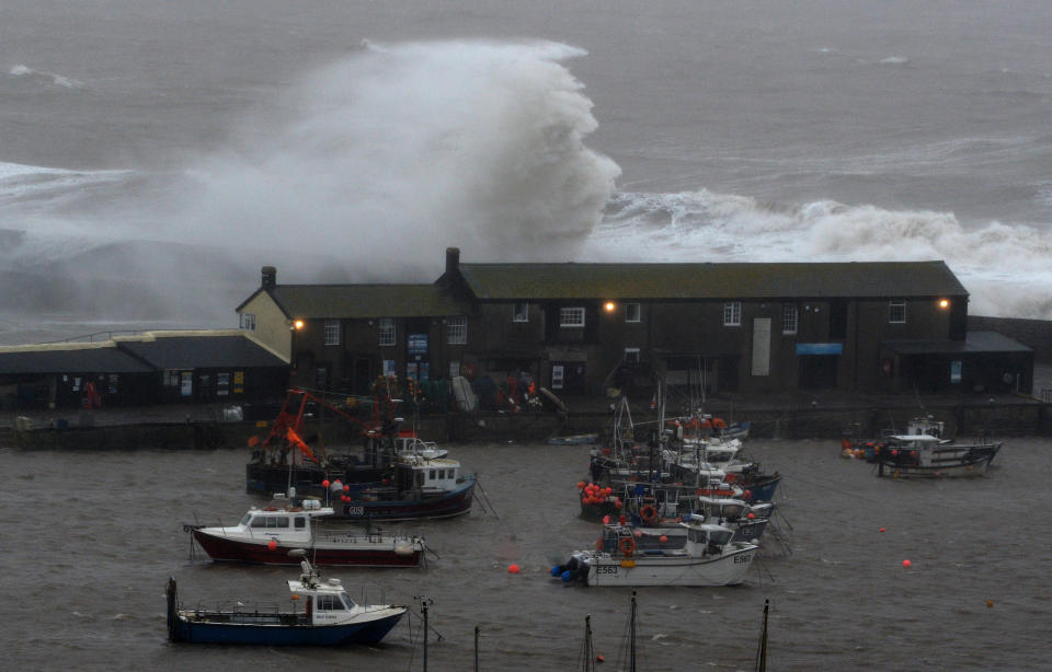 Storm Ciara sends waves crashing over houses in Lyme Regis, Dorset. (PA)