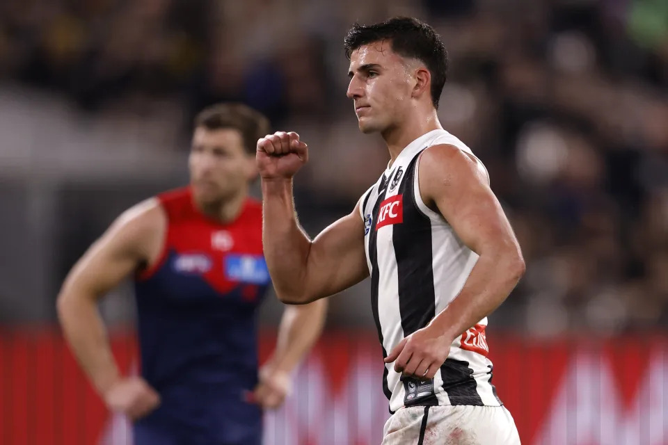 MELBOURNE, AUSTRALIA - AUGUST 23: Nick Daicos of the Magpies celebrates a goal during the round 24 AFL match between Melbourne Demons and Collingwood Magpies at Melbourne Cricket Ground, on August 23, 2024, in Melbourne, Australia. (Photo by Darrian Traynor/Getty Images)