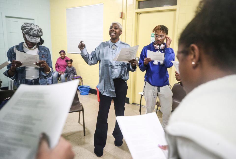 NyRee Clayton-Taylor, center, leads a rehearsal for Real Young Prodigys recently at the Parkhill Community Center in the Algonquin neighborhood. She uses Hip-Hop Based Education to help students with writing, reading and performing. She was named 2019 Kentucky Elementary Teacher of the Year.