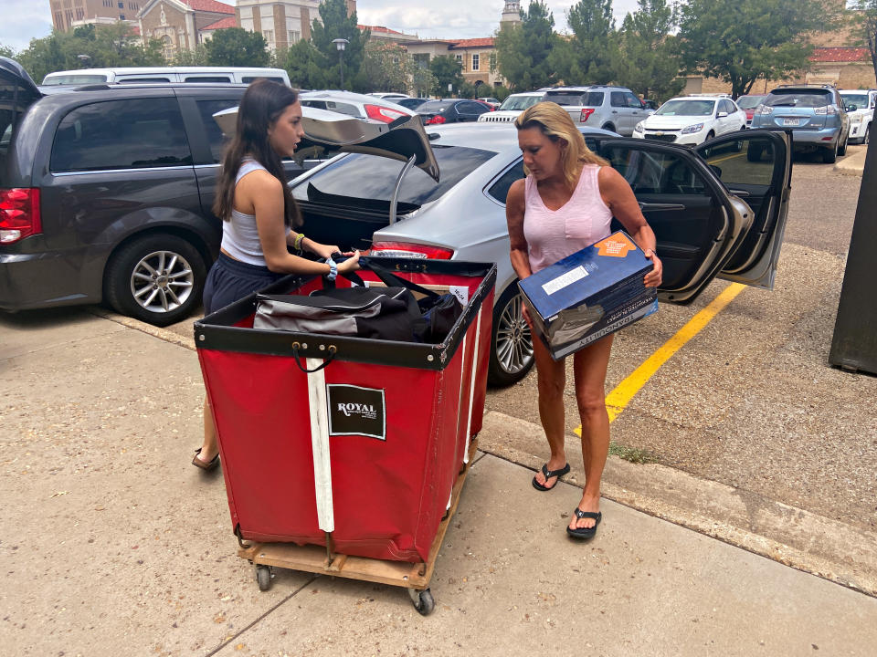 Kaitlyn Abercia is seen moving into her student residence at Gates Hall on the campus of Texas Tech University in Lubbock, Texas, U.S. on August 14, 2020. REUTERS/Brad Brooks