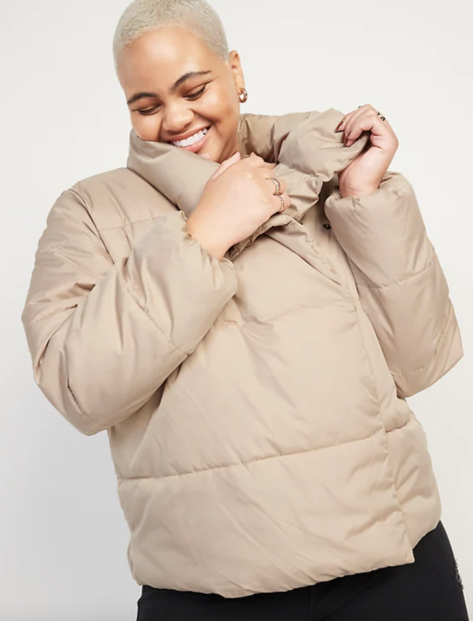 black model with short blonde hair in beige Old Navy Water-Resistant Double-Breasted Puffer Jacket 