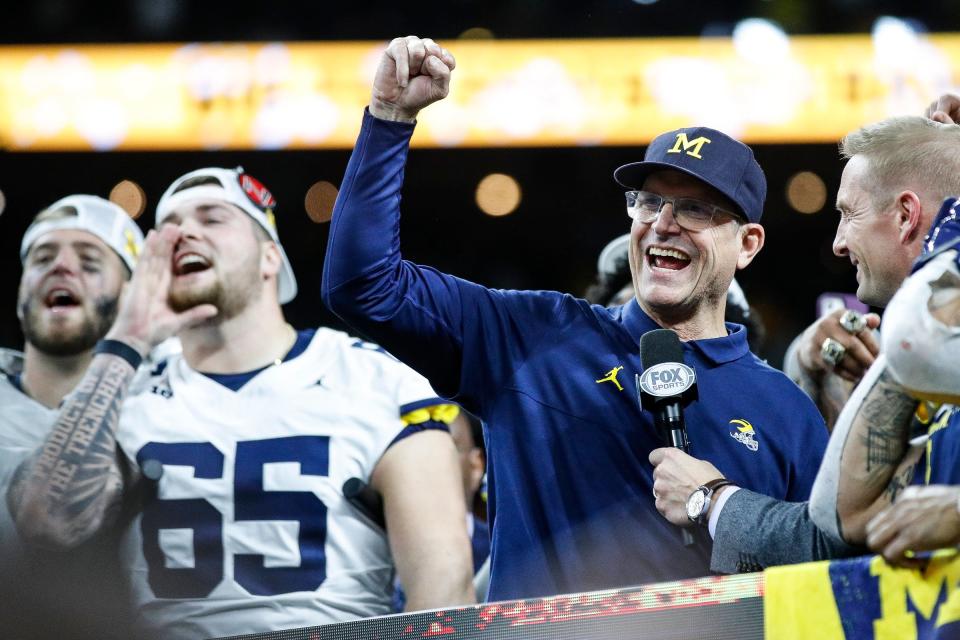 Michigan head coach Jim Harbaugh celebrates 26-0 win over Iowa at the Big Ten championship game at Lucas Oil Stadium in Indianapolis, Ind. on Saturday, Dec. 2, 2023.