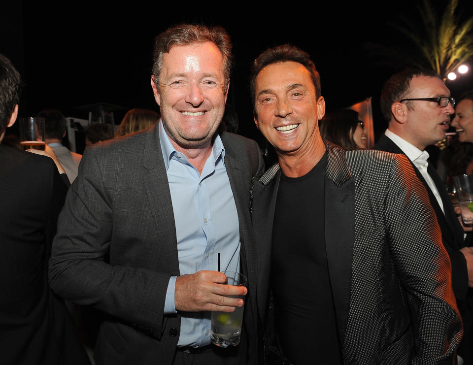 LOS ANGELES, CA - MAY 02:  Journalist Piers Morgan and choreographer Bruno Tonioli attended the Jaguar and BritWeek Event: A Villainous Affair at The London West Hollywood on May 2, 2014 in Los Angeles, California. A signature BritWeek event, the rooftop reception featured the new British villain in town, the 2015 F-TYPE Coupe.  (Photo by Angela Weiss/Getty Images for Jaguar Land Rover)