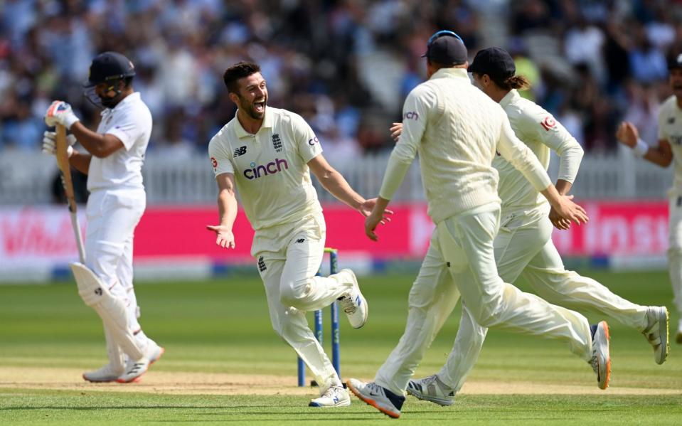 Mark Wood of England celebrates dismissing Rohit Sharma of India - GETTY IMAGES