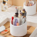 <p> Rotating makeup storage is a brilliant way to max out limited surface space in a small bedroom. Featuring multi compartments so you can fit everything in from your lipgloss to your eyebrow brush, this simple spinning design from ArteurHouse at Etsy, allows you to see everything you have with the utmost ease. </p>