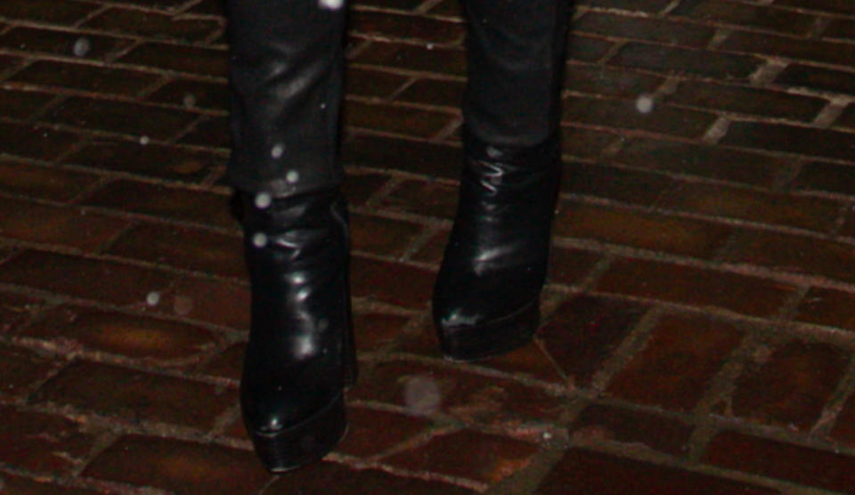 Mariah Carey, boots, black boots, leather boots, platforms, platform boots, tall boots, Burberry, Chanel, earmuffs, poncho, Aspen, Colorado, heels, high heels