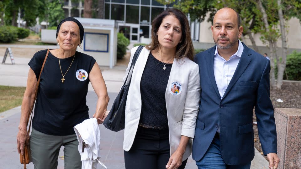 Karim Iskander, right, and wife Nancy Iskander, center, arrive for Rebecca Grossman sentencing on Monday, June 10, 2024 in Van Nuys, California. - Brian van der Brug/Los Angeles Times/Getty Images