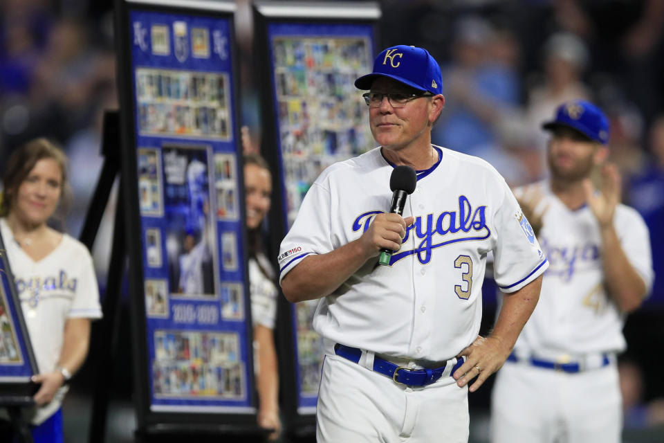 Kansas City Royals manager Ned Yost (3) speaks about his retirement during a ceremony before a baseball game against the Minnesota Twins at Kauffman Stadium in Kansas City, Mo., Friday, Sept. 27, 2019. (AP Photo/Orlin Wagner)