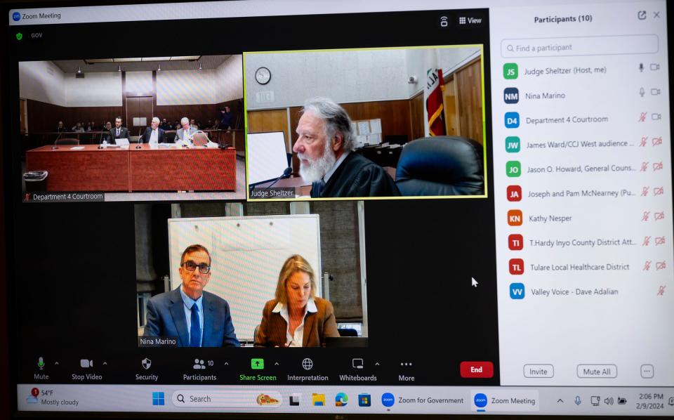 Former Healthcare Conglomerate Associates' CEO Dr. Yorai “Benny” Benzeevi, left, and his attorney Nina Marino appear Friday, February 9, 2024 via Zoom during a hearing conducted by Judge Michael Sheltzer in Tulare County Superior Court .