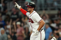 Atlanta Braves' Matt Olson gestures as he runs the bases after hitting a two-run home run during the fourth inning of the team's baseball game against the New York Mets on Tuesday, Aug. 16, 2022, in Atlanta. (AP Photo/John Bazemore)