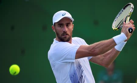 2016 Rio Olympics - Tennis - Quarterfinal - Men's Singles Quarterfinals - Olympic Tennis Centre - Rio de Janeiro, Brazil - 12/08/2016. Steve Johnson (USA) of USA in action against Andy Murray (GBR) of Britain. REUTERS/Toby Melville