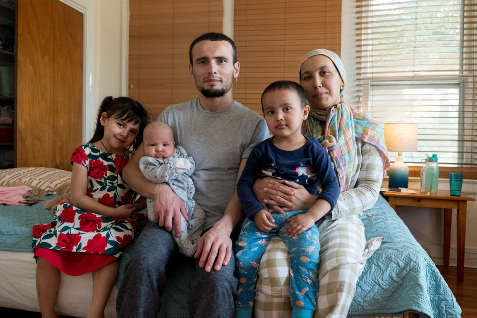 Muhammad spends time with his wife and three children at the San Antonio shelter. (Photo: Ilana Panich-Linsman for HuffPost)