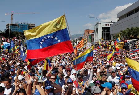 Opposition supporters take part in a rally against Venezuelan President Nicolas Maduro's government in Caracas, Venezuela February 2, 2019. REUTERS/Carlos Garcia Rawlins