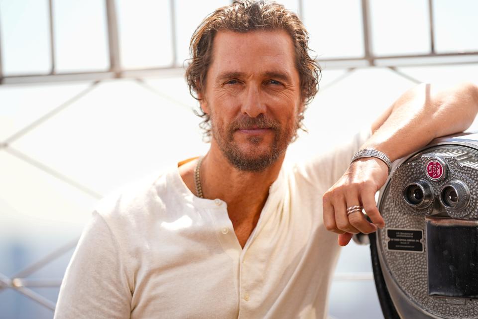 Matthew McConaughey leaning against a viewfinder