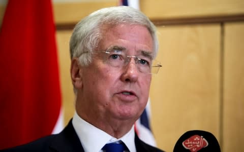 Britain's Defence Secretary Michael Fallon  - Credit: AFP/SABAH ARAR