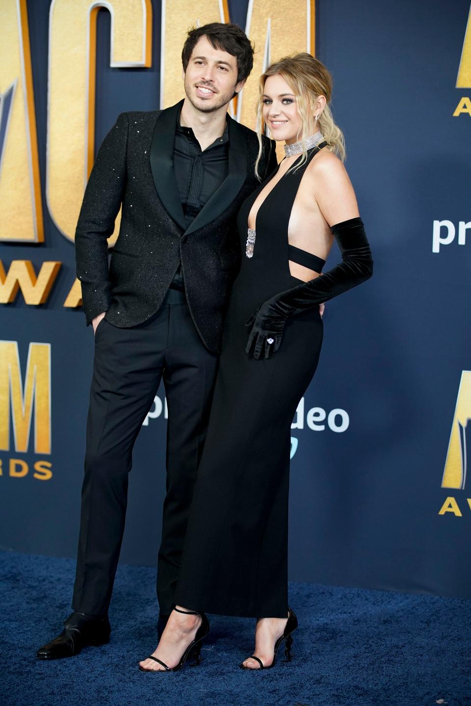 Kelsea Ballerini and Morgan Evans arrive for the 57th Academy of Country Music Awards at Allegiant Stadium in Las Vegas, Nev., Monday, March 7, 2022.