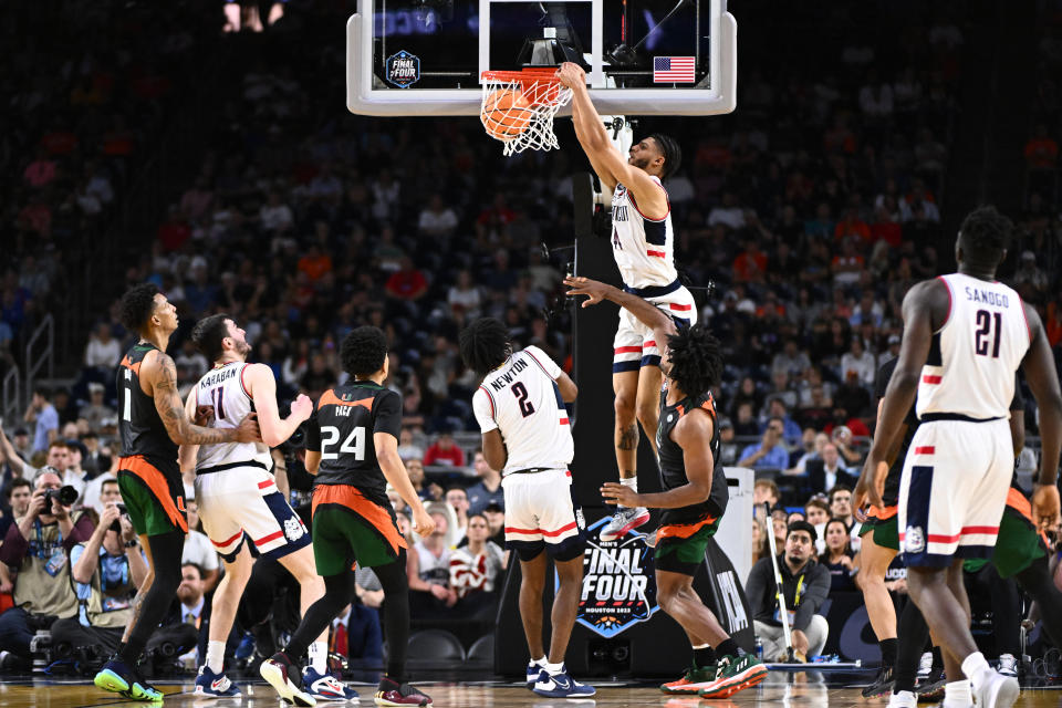 HOUSTON, TEXAS - APRIL 01: Andre Jackson Jr. #44 of the Connecticut Huskies dunks the ball against the Miami (Fl) Hurricanes in the second half during the NCAA Men&#x002019;s Basketball Tournament Final Four semifinal game at NRG Stadium on April 01, 2023 in Houston, Texas. (Photo by Brett Wilhelm/NCAA Photos via Getty Images)