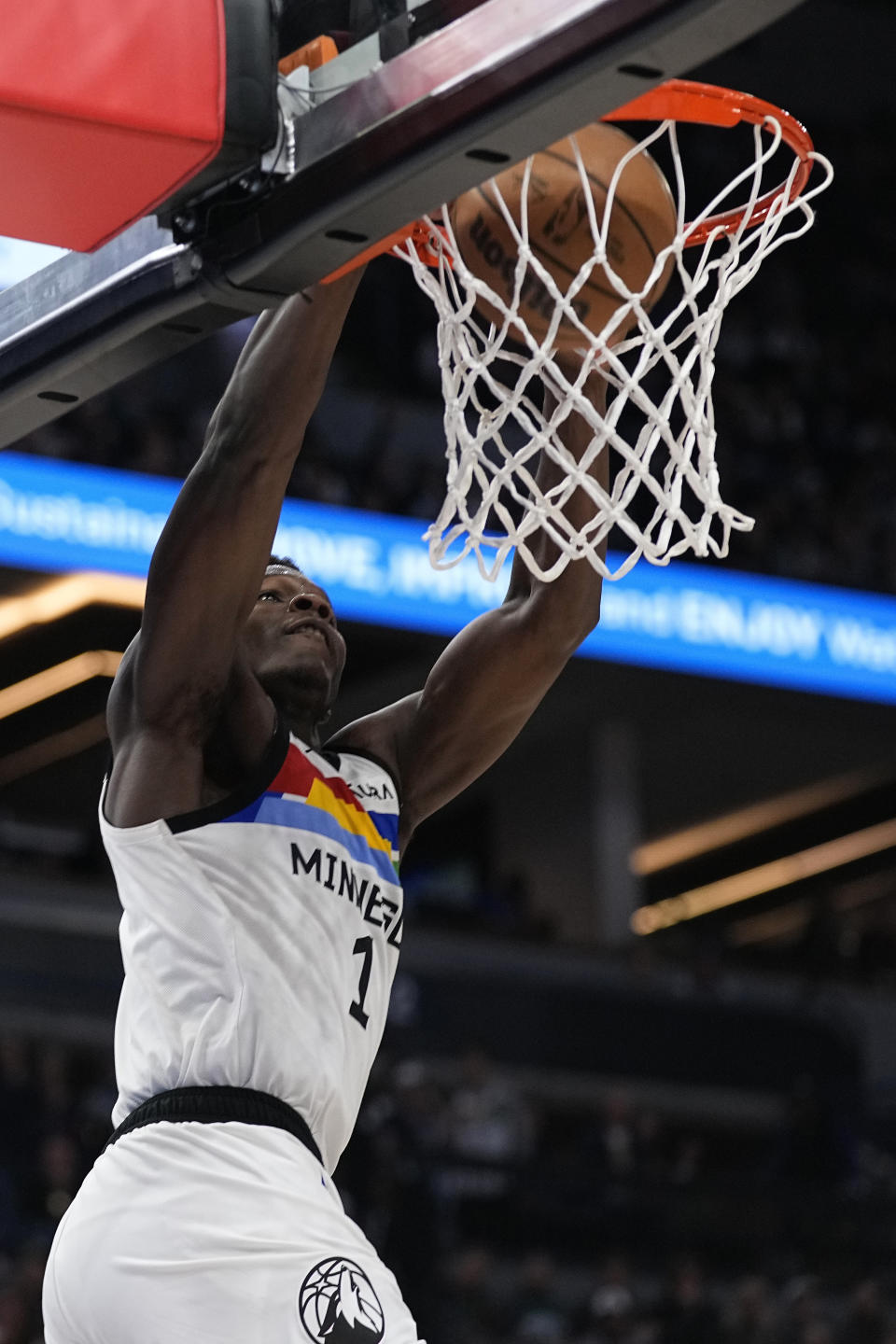 Minnesota Timberwolves guard Anthony Edwards (1) dunks during the second half of an NBA basketball game against the Phoenix Suns, Friday, Jan. 13, 2023, in Minneapolis. (AP Photo/Abbie Parr)