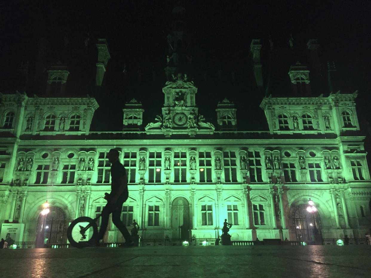 Paris’ Hôtel de Ville (city hall) is illuminated in green following the announcement by President Trump that the U.S. will withdraw from the 2015 Paris accord and try to negotiate a new global deal on climate change. (Photo: Nadine Achoui-Lesage/AP)