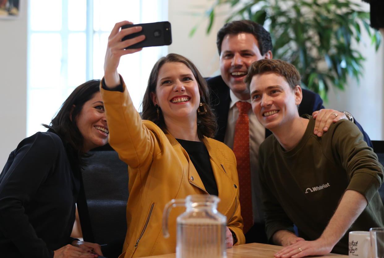 Jo Swinson (centre) takes a selfie with the co-founders of WhiteHat Sophie Adelman and Euan Blair, along with Lib Dem MEP Antony Hook, at WeWork in Marylebone, London, where she launched her campaign to succeed Sir Vince Cable as leader of the Liberal Democrats. (Photo by Yui Mok/PA Images via Getty Images)