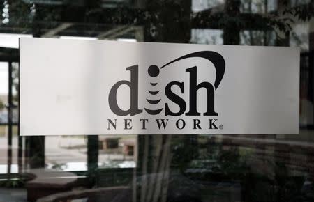 The sign in the lobby of the corporate headquarters of Dish Network is seen in the Denver suburb of Englewood, Colorado April 6, 2011. REUTERS/Rick Wilking