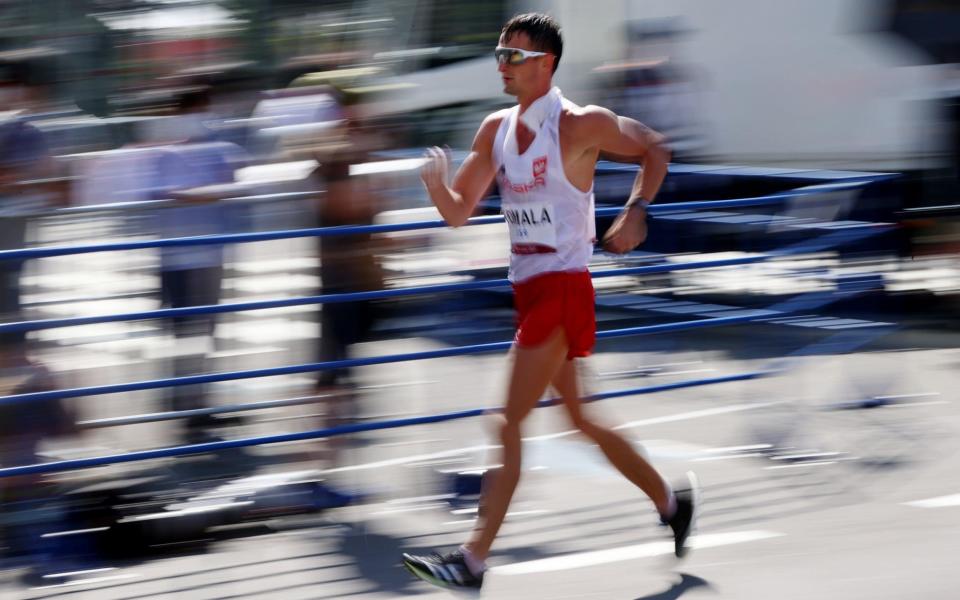 Tokyo 2020 Olympics - Athletics - Men's 50km Walk - Sapporo Odori Park, Sapporo, Japan - August 6, 2021. Dawid Tomala of Poland in action  - REUTERS