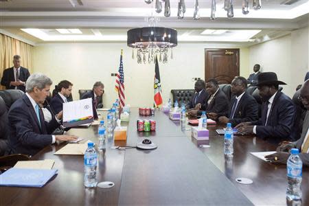 South Sudan's President Salva Kiir Mayardit (2nd R) meets with U.S. Secretary of State John Kerry (L) at the President's Office in Juba May 2, 2014. REUTERS/Saul Loeb/Pool