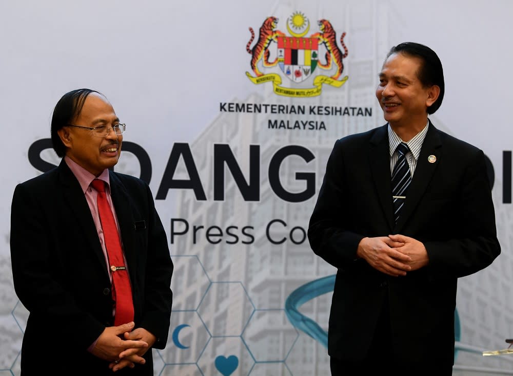 Health deputy director-general (Medical) Datuk Dr Rohaizat Yon (left) and Health director-general Datuk Dr Noor Hisham Abdullah during a press conference in Putrajaya June 10, 2020. — Bernama pic