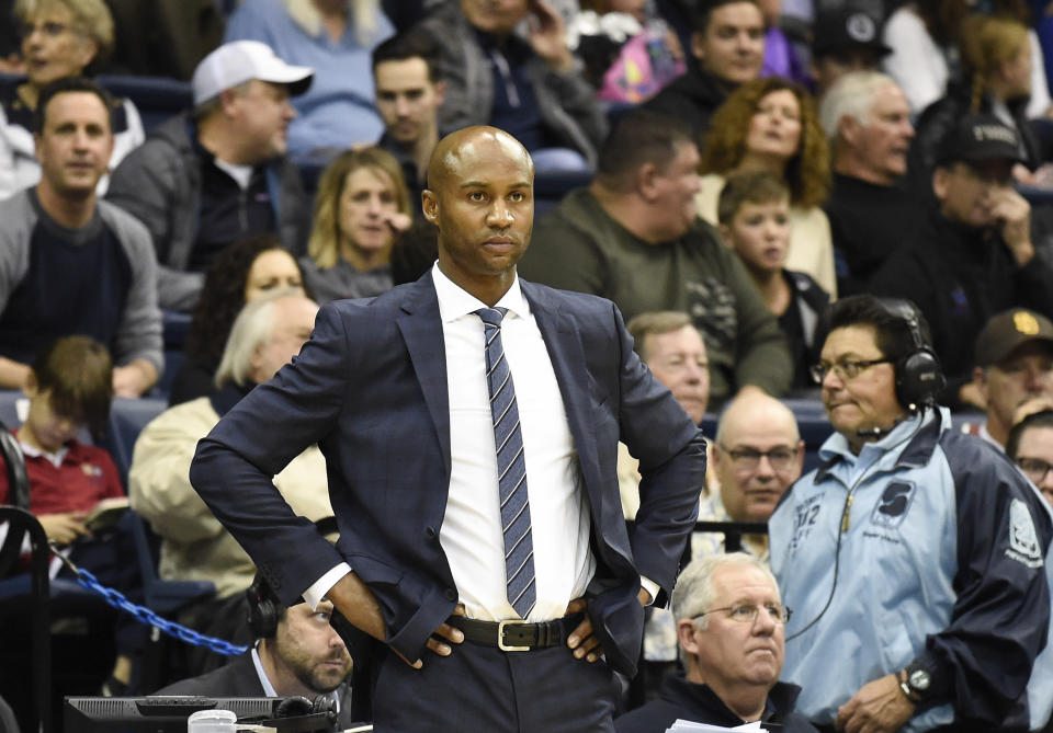 San Diego head coach Lamont Smith looks on during the first half of an NCAA college basketball game against Gonzaga Thursday, Feb. 22, 2018, in San Diego. (AP Photo/Denis Poroy)