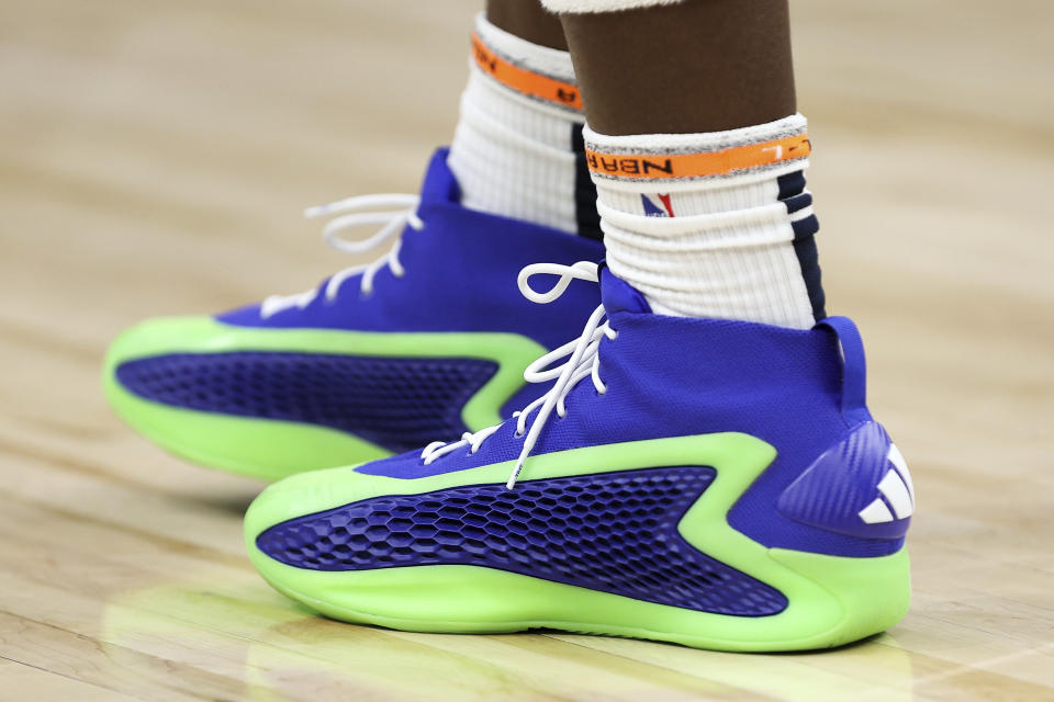 The shoes worn by Minnesota Timberwolves guard Anthony Edwards are seen during the second half of an NBA basketball game against the Phoenix Suns Sunday, April 14, 2024, in Minneapolis. (AP Photo/Matt Krohn)