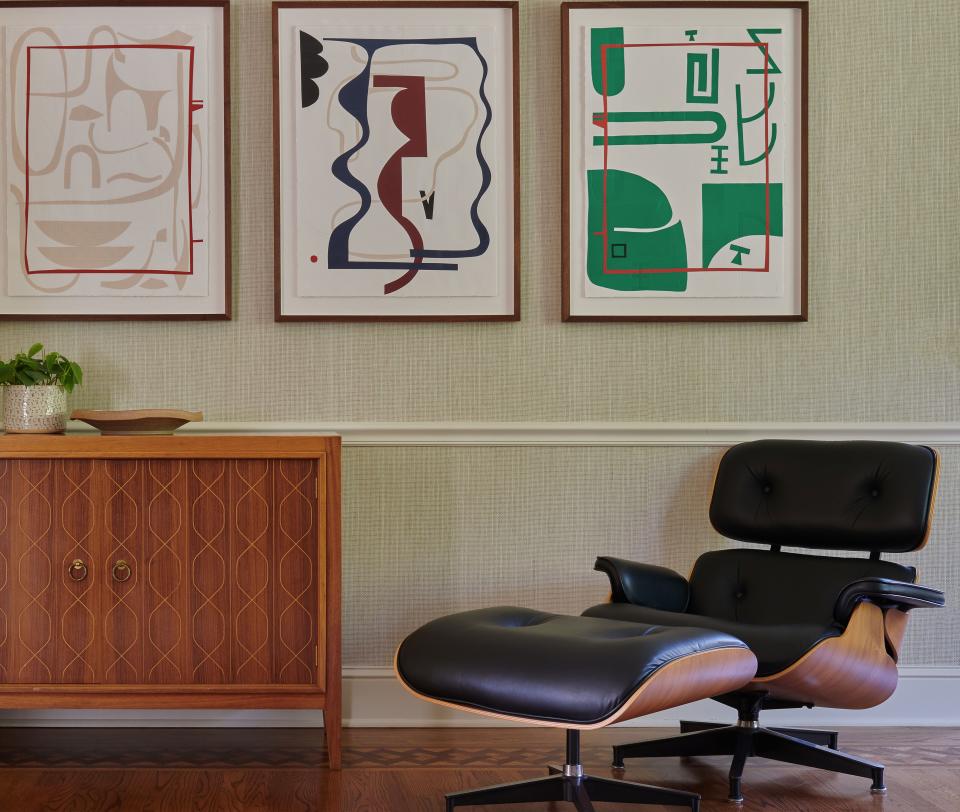 The wood and black leather Eames lounge chair and ottoman set is one of Ganley’s imports from her house in London. A trio of Elizabeth Atterbury abstract prints lends a fanciful contrast. The cabinet is vintage.