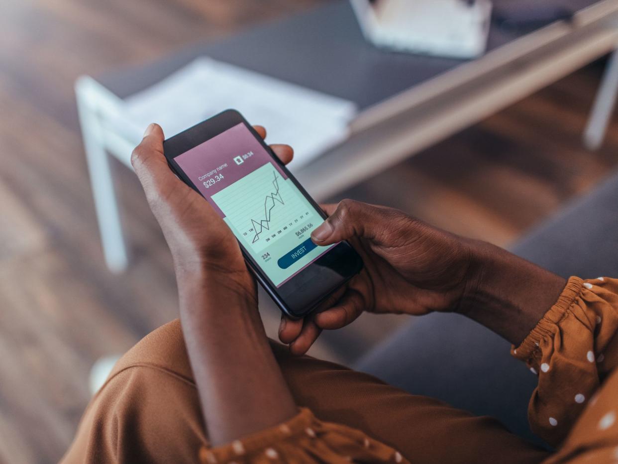 Close up of women's hands holding smartphone