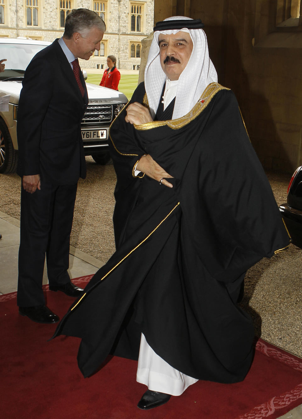 Bahrain's King Hamed bin Isa Al Khalifa arrives for the Monarchs Jubilee lunch at Windsor Castle in Windsor, England, Friday, May 18, 2012. Critics are aghast at the choice of some guests for the lunch, among them a king whose Gulf nation has been engaged in a brutal crackdown on political dissent. The list for Friday's lunch, sent on the advice of British diplomats, includes Bahrain's King Hamad bin Isa Al Khalifa. Swaziland's King Mswati III, accused of living in luxury while his people go hungry, is also invited. (AP Photo/Kirsty Wigglesworth, pool)